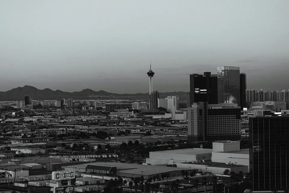 Las Vegas skyline with mountains in the distance.
